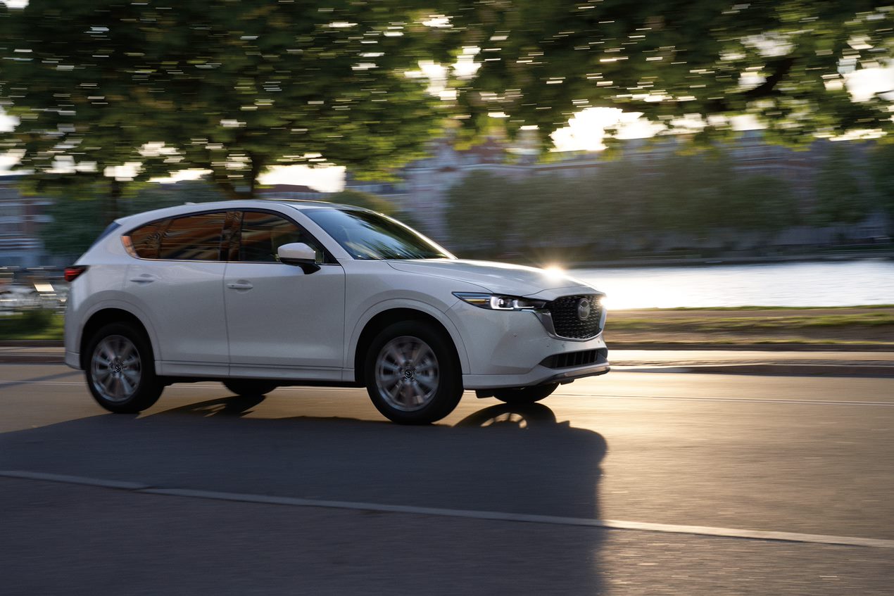 Mazda CX-5 driving down the road